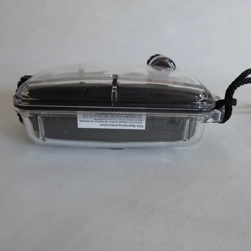USED ONCE WATERPROOF SPORT UTILITY COMPACT 35mm CAMERA IN CASING